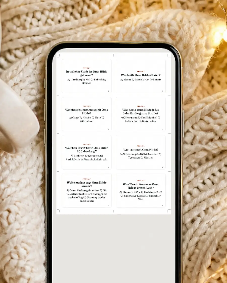 Familien-Quizshow: Wer kennt … am besten?: echte Seite dieses Geschenks auf einem Handy-Bildschirm